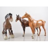 Beswick model of a Palamino horse, 23m, another Beswick model of a Palamino horse,