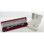 Matching silver snake link design necklace and bracelet, 5mm gauge, the necklace 43cm long,