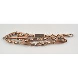 Rose metal fancy bar and link single albert watch chain, 37cm long, fitted with a T bar and swivel,