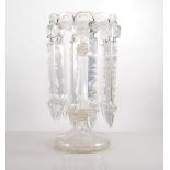 Pair of lustres, clear glass with gilt highlights and 22cm prismatic drops, overall height 30cm.