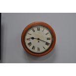 Mahogany cased dial clock, circular face with Roman numerals, some repainting,