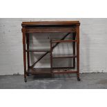 Late Victorian walnut table, in the style of Godwin, rectangular galleried top,