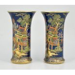 Pair of Carltonware vases, powder blue ground, enamelled with chinoiserie scenes, height 20.