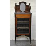 Edwardian mahogany display cabinet, three quarter gallery with an oval mirror, rectangular top,