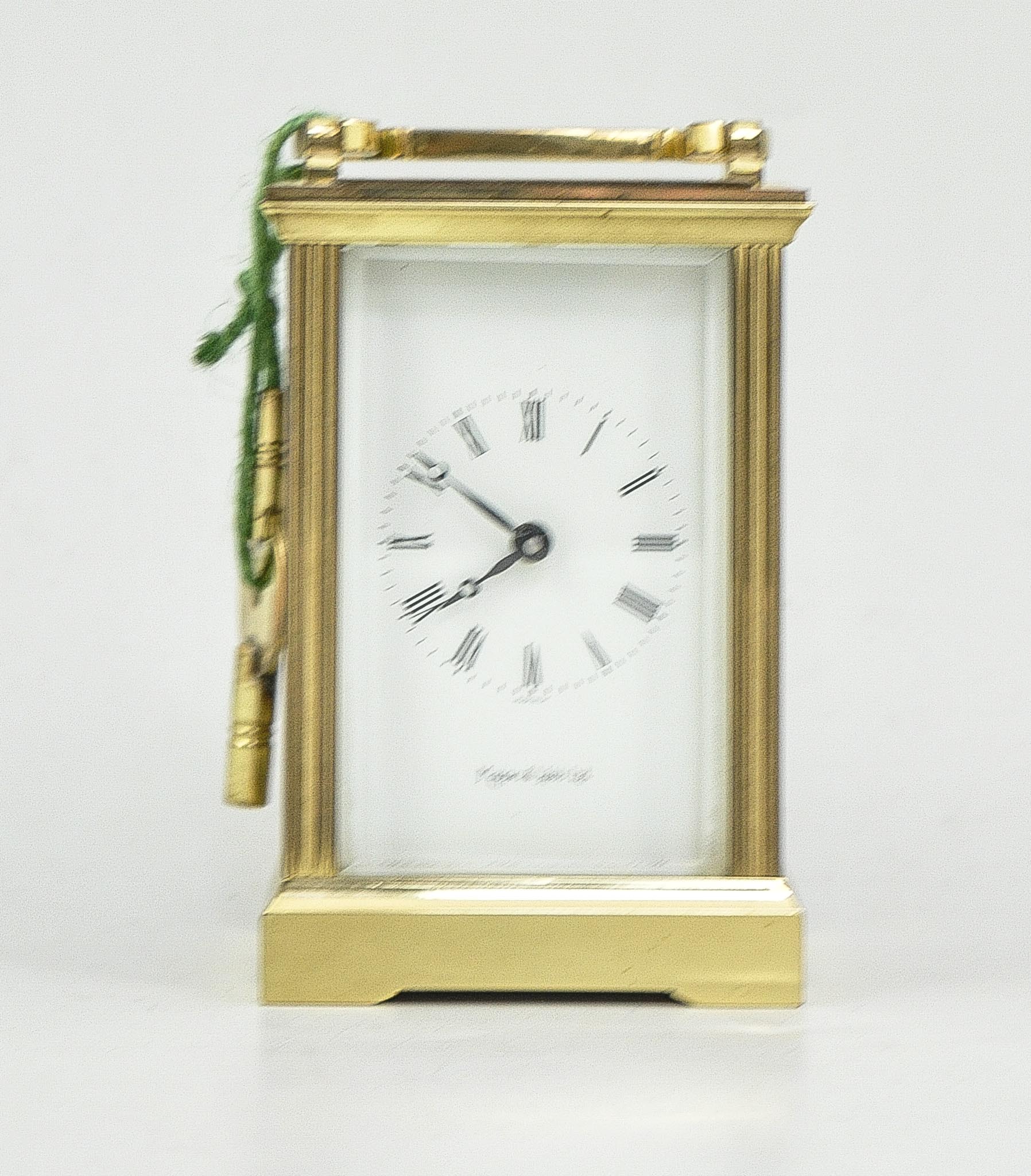 Brass carriage clock, square dial with Roman numerals, signed Mappin & Webb Limited,