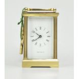 Brass carriage clock, square dial with Roman numerals, signed Mappin & Webb Limited,