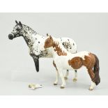 Beswick model of a Piebald horse, height 17cm and a model of a racehorse, damaged, (2).