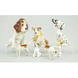 Three Beswick models of hounds, 8cm and smaller, two Sylvac dog models,