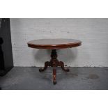 Victorian mahogany loo table, circular tilt top with a moulded edge, plain frieze, turned column,