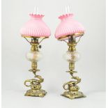 Pair of Victorian brass oil lamps, dragon columns and cast openwork bases,
