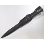 A German WWII K98 knife bayonet, stamped "41as", with metal scabbard stamped 8499 and leather frog,