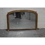 Victorian overmantel mirror, gold painted moulded frame on pottery supports, width 112cm,