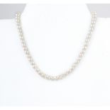 A single row cultured pearl necklace, 7mm pearls (60),