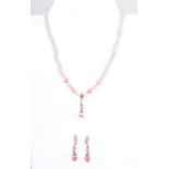 A cultured pearl and rhodolite suite of necklace and earrings. a pair of 9 carat yellow gold 8.