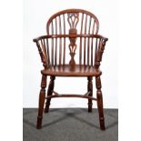 A Victorian yew wood and elm low back Windsor chair, narrow arms, pierced splat, shaped seat,