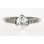 A diamond solitaire ring,