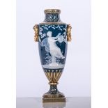 A Minton amphora shape pate-sur-pate peacock blue vase,