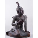 A Burmese wood gesso and "jewelled" figure, Medaw Shreshea Nat, kneeling, losses and old damage,