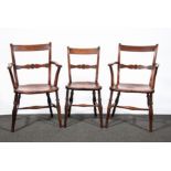 A set of six elm and fruitwood bar back kitchen chairs, broad plain crestings over horizontal rails,