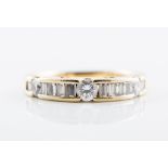 A diamond half eternity ring, diamonds (10), baguette cut stones, spaced by diamonds (3),
