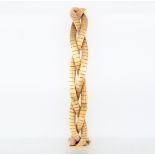 A hallmarked 9 carat yellow gold bracelet of plaited design with fine texture, 7mm wide,