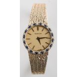 Beuche Girod - a lady's 9 carat yellow gold bracelet watch,