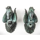 A pair of cast metal bell pulls, after Sir Joseph Edgar Boehm formed as horses heads,