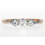 A diamond three stone ring,