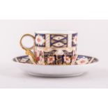 A Royal Crown Derby bone china coffee can and saucer, 1911,