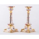 A pair of Royal Crown Derby bone china silver shaped candlesticks, 1987, Old Imari pattern, No.