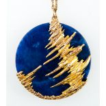 A lapis lazuli pendant and chain,
