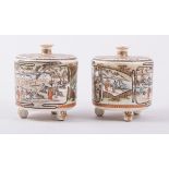 A pair of Satsuma brush pots, possibly Meiji, decorated with figurative scenes,