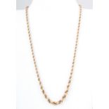 A hallmarked 9 carat gold graduated polished and textured rope design necklace,