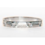 A platinum wedding ring, 3mm wide, with engraved and polished rectangular sections to the pattern,