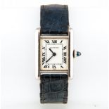 Cartier - a lady's 18 carat white gold tank watch, the cream rectangular roman numeral dial,