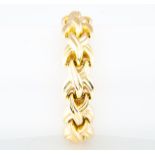 A yellow metal bracelet, polished plaited design 17mm wide, stamped 750, approximate weight 42.3gms.