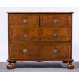 A George II style walnut chest of drawers,