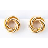 A pair of hallmarked 18 carat gold earrings, open centre with entwined polished rings,