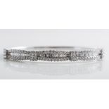 A modern diamond set bangle,