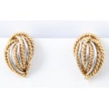 A pair of 18 carat yellow gold earrings,