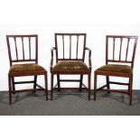 A set of eight late Georgian mahogany dining chairs, square backs with reeded slats,