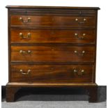 A George III mahogany chest of drawers,