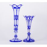 A Victorian blue overlaid and opaque glass trumpet shaped vase, gilt decoration,