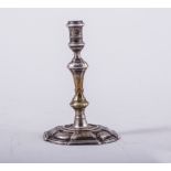 A George II silver taper stick, possibly by James Gould, London 1737, shouldered knopped shaft,