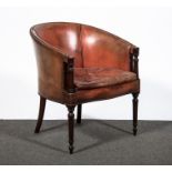 A George IV style brown leather close studded tub chair, hoop back, squab cushion,
