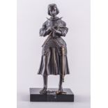 After Marie-Christine d'Orleans, Joan of Arc in armour carrying a sword,