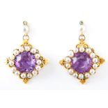 A pair of amethyst and pearl earrings - the circular faceted amethyst, 11mm,