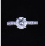 A diamond solitaire ring,