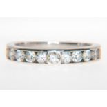 A diamond half eternity ring, diamonds (11), brilliant cut stones,