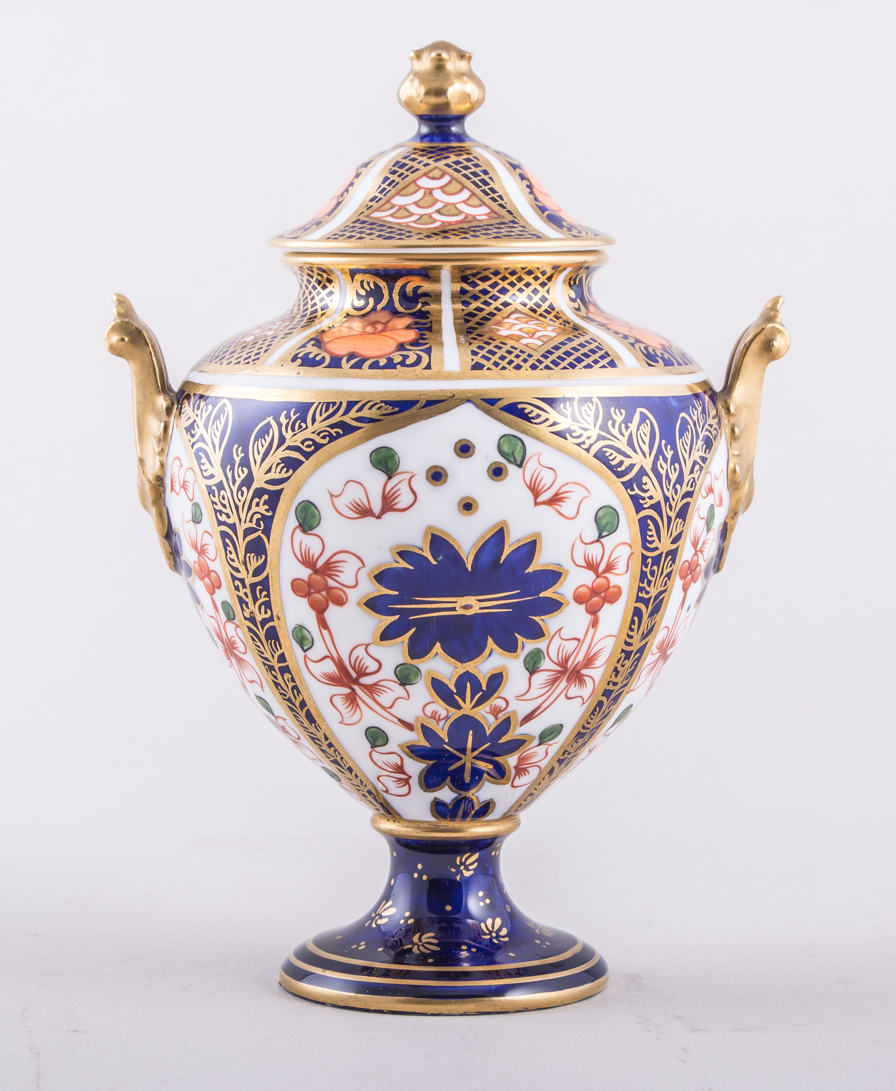 A Royal Crown Derby bone china amphora shaped vase with cover, 1902, Old Imari pattern No.
